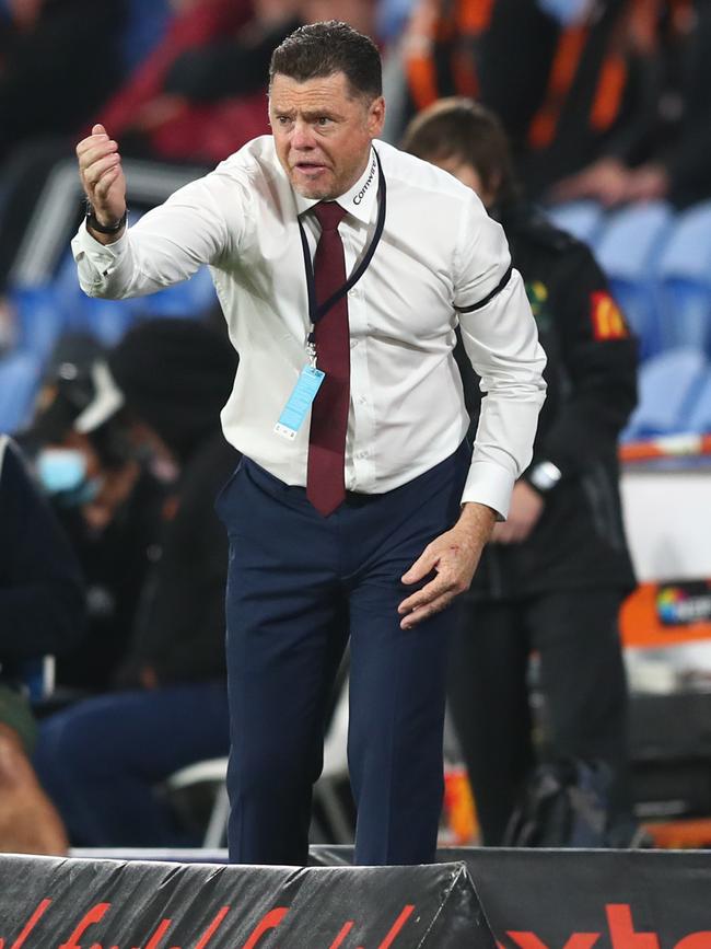 Adelaide United coach Carl Veart calls the shots to his players against Brisbane Roar at Cbus Super Stadium. Picture: Getty Images