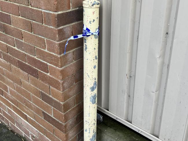 A small remnant of police tape outside. Picture: news.com.au