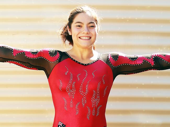 Georgia Godwin poses in Manly West near Brisbane on Saturday, February 10, 2018. Ms Godwin is hopeful she will be selected to compete at the Commonwealth Games. (AAP Image/Claudia Baxter)