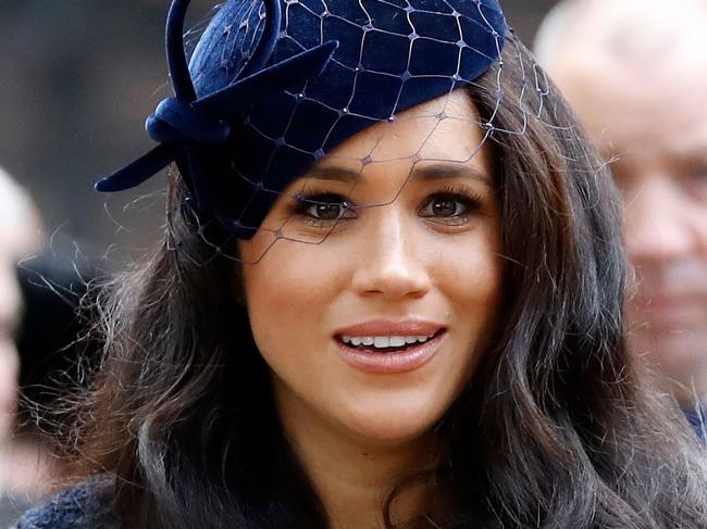 (FILES) In this file photo taken on November 07, 2019 Meghan, Duchess of Sussex leaves after paying her respects during a visit to the Field of Remembrance at Westminster Abbey in central London on November 7, 2019. - Prince Harry's wife Meghan will make an instant start to life away from Britain's royal frontline by narrating a new film about a family of African elephants, Disney announced on Thursday. (Photo by Tolga AKMEN / AFP)