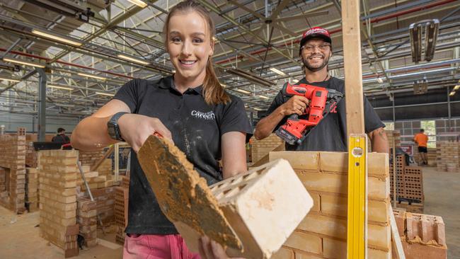 Tradie students Elizabeth Briggs, 20, and Ray Kyle, 35, at TAFE SA’s Tonsley campus in Adelaide’s south. Picture: Ben Clark