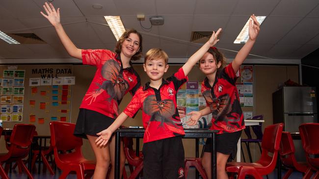 Halle, Stella, and Reuben Wedel are excited to start the 2024 school trip at Alawa Primary School. Picture: Pema Tamang Pakhrin