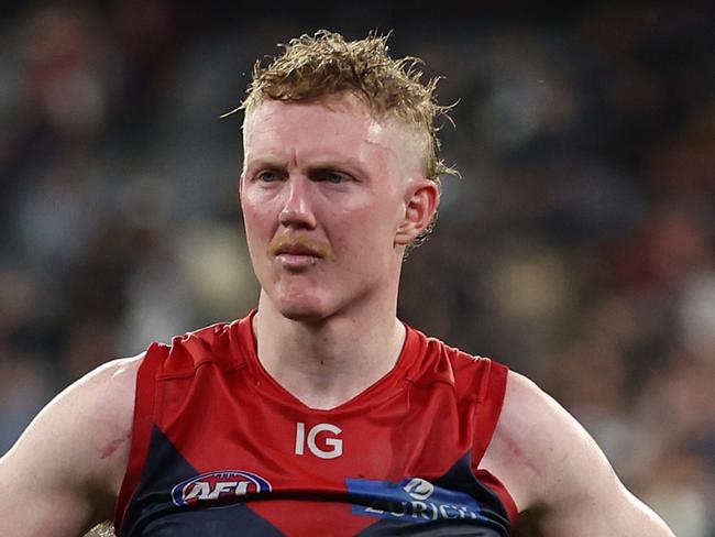 MELBOURNE, AUSTRALIA - SEPTEMBER 15: Clayton Oliver of the Demons is dejected after the Demons were defeated by the Blues during the AFL First Semi Final match between Melbourne Demons and Carlton Blues at Melbourne Cricket Ground, on September 15, 2023, in Melbourne, Australia. (Photo by Robert Cianflone/Getty Images)