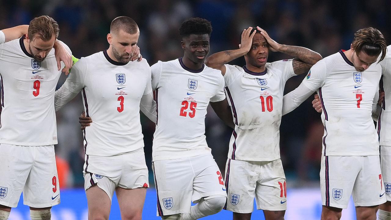 England's players watch the penalty shootout during the UEFA EURO 2020 final.