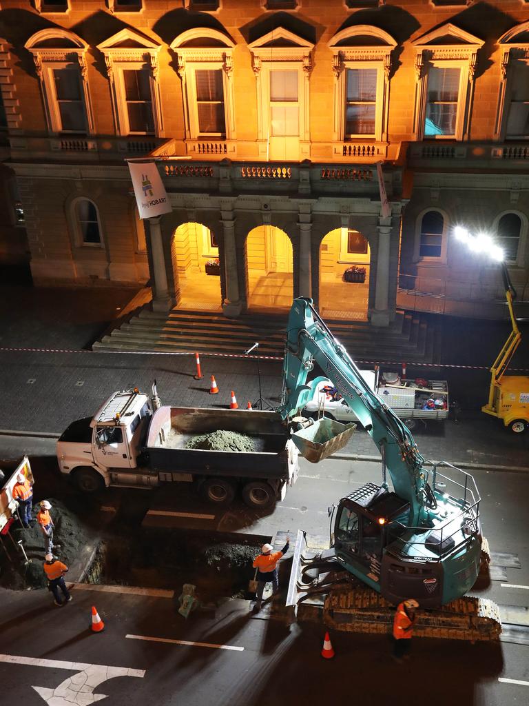 Work in Macquarie Street Hobart on the hole that will house the chamber performance artist Mike Parr will live in for 72 hours during Dark Mofo. Picture: NIKKI DAVIS-JONES