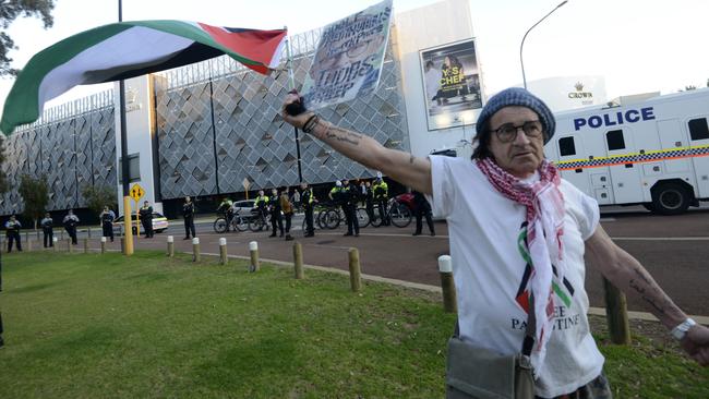 A protestor outside Crown Casino Perth. Picture: NCA NewsWire / Sharon Smith