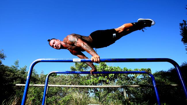 Council has just approved 10 new outdoor gyms for the coast beach areas. AMPM Fitness guru Johann Ofner (m0422728042) uses the fitness equipment at Burleigh and would love to see more of it to train on. Photo: Kit Wise