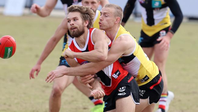 Dan Butler gets a handball away during St Kilda’s match simulation. Picture: Michael Klein