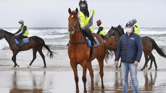 Champion trainer Danny O'Brien on 13th Beach Barwon Heads early morning training. Danny with 2019 Melbourne Cup winner Vow and Declare on the beach during a workout. Picture: David Caird