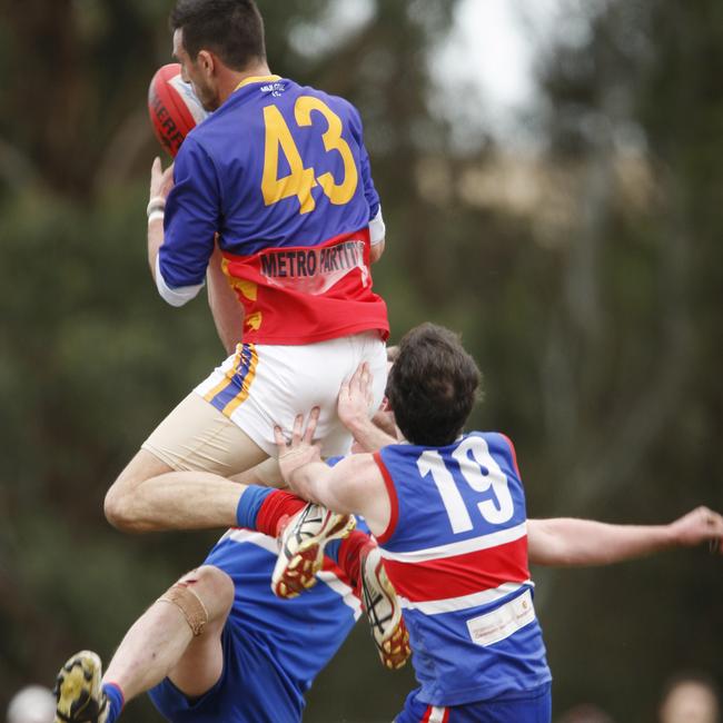 Jarrod Fearon-Brown leaps for a hanger.
