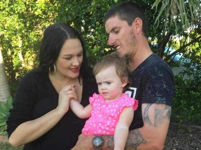 Lachlan Francis with his former partner Emily Burns and one of their children.