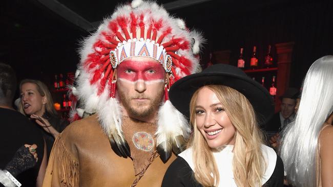 Singer Hilary Duff and boyfriend Jason Walsh are in trouble after their costume choice for Friday’s party.