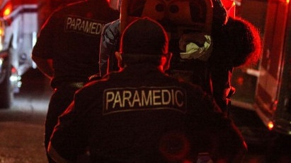 A Queensland paramedic says she was left traumatised after retrieving a crash victim’s arm from a tree.