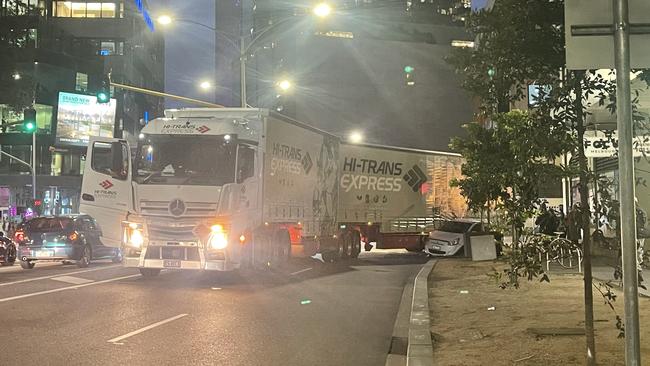 A truck appeared to crash into a car as it turned left from City Rd onto Power St in Southbank.