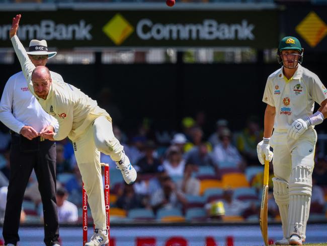 England's Jack Leach (L) was belted by Australia’s batsmen at the Gabba. Picture: Patrick Hamilton/AFP