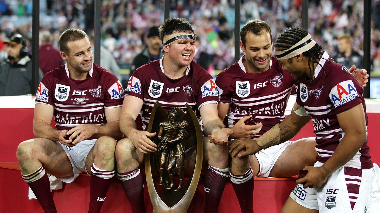 Brett Stewart and Sea Eagles teammates celebrate with the Provan-Summons Trophy in 2011. (Photo by Matt King/Getty Images)