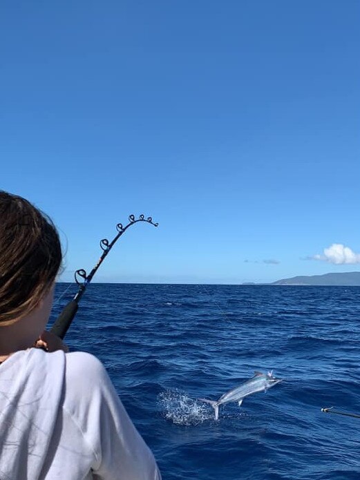 Townsville juniors catch a marlin.