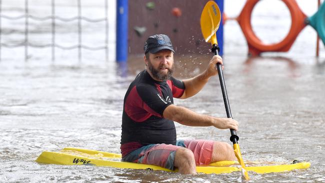 Going for a paddle at Northey St, Hertson, on Saturday. Picture: John Gass