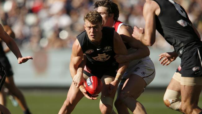 Patrick Cripps is tackled by Jack Steele. Picture: Getty Images