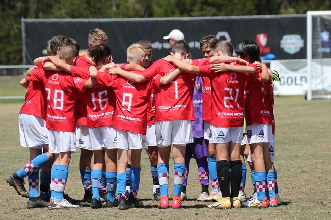 The Premier Invitational football tournament on the Gold Coast. Gold Coast Knights Red v Springfield United under-13s in action. Picture: Mike Batterham.