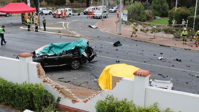 Emergency services crews examine the scene of the fatal crash at Urrbrae, where Chief-Supt Joanne Shanahan and another woman were killed. Picture: Dean Martin/AAP