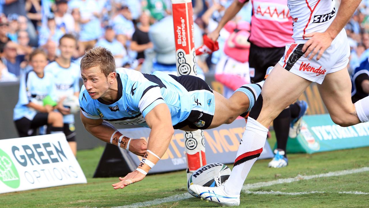 Nathan Stapleton scores for the Sharks. AAP Image/Action Photographics, Robb Cox.