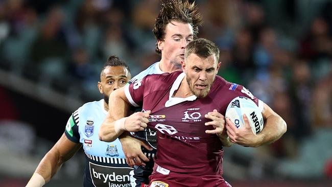 ADELAIDE, AUSTRALIA - NOVEMBER 04: Kurt Capewell of the Maroons is tackled during game one of the 2020 State of Origin series between the Queensland Maroons and the New South Wales Blues at the Adelaide Oval on November 04, 2020 in Adelaide, Australia. (Photo by Cameron Spencer/Getty Images)