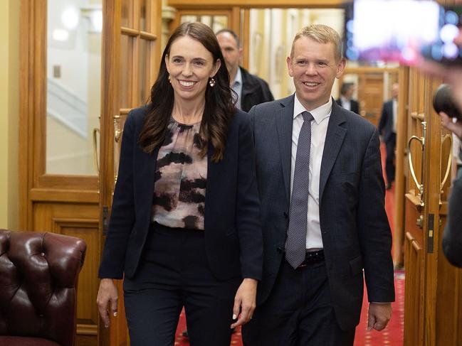 New Zealand Prime Minister Jacinda Ardern and Chris Hipkins arrive at the Labour caucus meeting. Picture: AFP