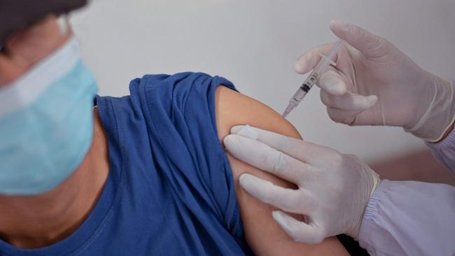 Australia’s booster rate lags behind other countries, with more than 30 per cent of the eligible population yet to come forward for a third or fourth jab. Picture: AFP