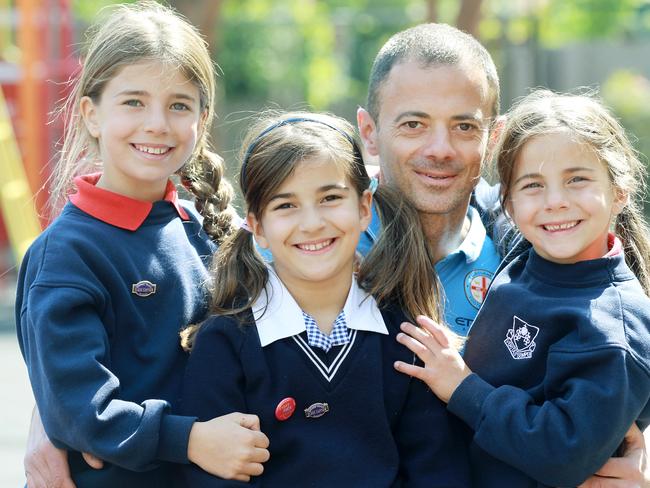 Walk to School month, featuring former professional soccer player and now Melbourne City assistant coach Ivan Jolic and his three daughtersIvanka, 9years, Alannah, 8years, Mia,6yearsPicture:  Janine Eastgate