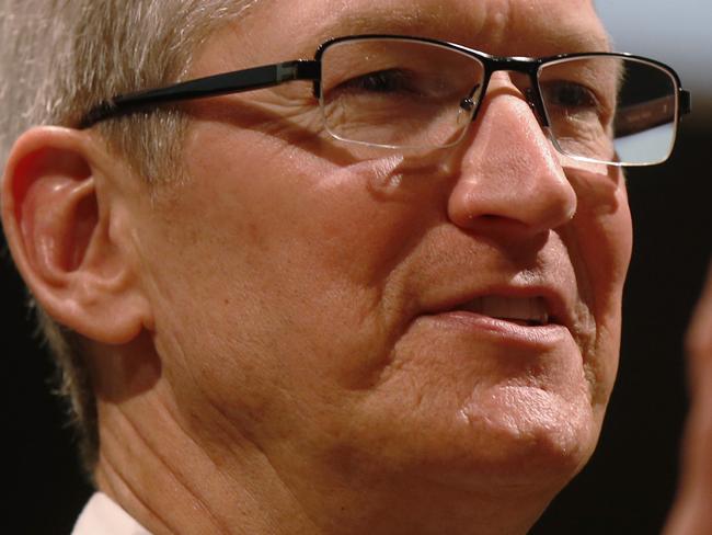 In this photo taken Nov. 15, 2015, Apple CEO Tim Cook speaks in Milan, Italy. A U.S. magistrate judge has ordered Apple to help the FBI break into a work-issued iPhone used by one of the two gunmen in the mass shooting in San Bernardino, California, a significant legal victory for the Justice Department in an ongoing policy battle between digital privacy and national security. Apple CEO Tim Cook immediately objected, setting the stage for a high-stakes legal fight between Silicon Valley and the federal government. (AP Photo/Luca Bruno)