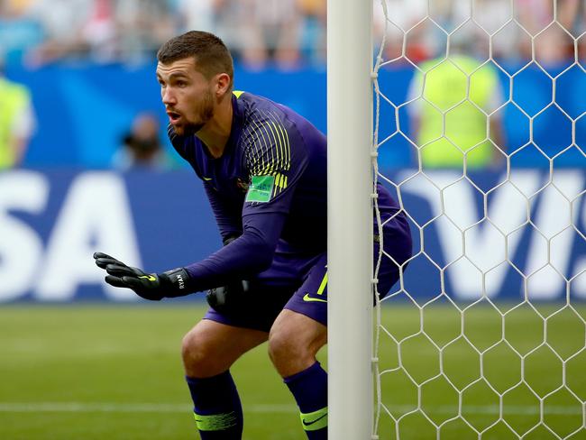 Socceroo’s goal keeper Mathew Ryan gives direction to his defensive line during the match. Picture: Toby Zerna