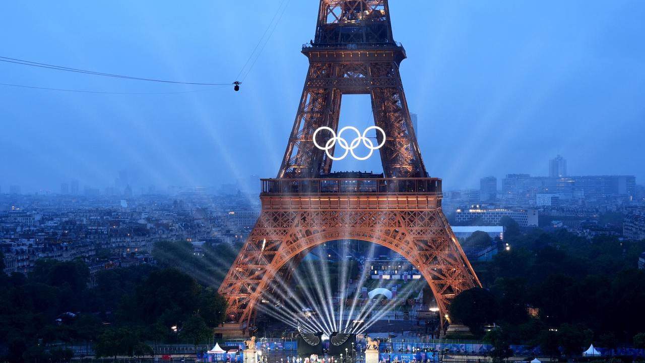 The Eiffel Tower lit up Parisian skies. Picture: Cheng Min-Pool/Getty Images