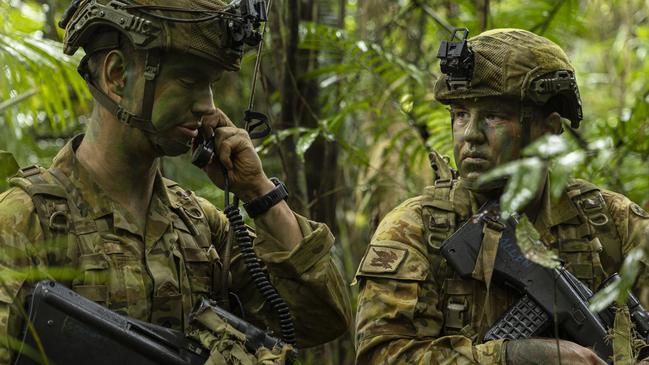 Australian Army officer Lieutenant Jan Schmidt (left) and soldier Sergeant Joshua Allen from 2nd Cavalry Regiment receive orders during Exercise Regional Warfighter at Tully Training Area, Queensland. PHOTO: CPL Jack Pearce