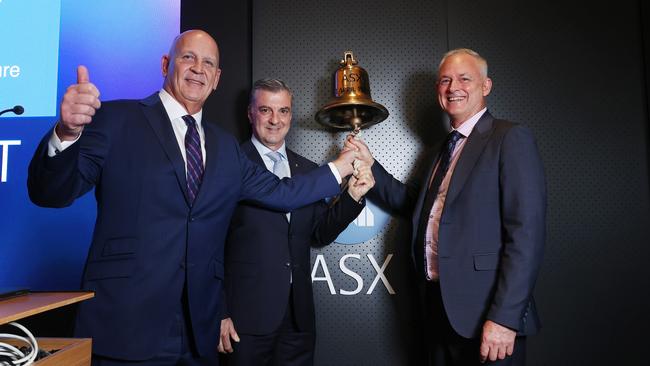 DigiCo boss Bryan Marsh and chairman Joseph Carrozzi, with Global Switch boss Damon Reid at the ASX. Picture: John Feder/The Australian