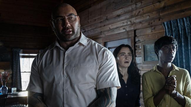 From left: Dave Bautista, Abby Quinn, and Nikki Amuka-Bird in Knock at the Cabin