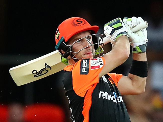 GOLD COAST, AUSTRALIA - JANUARY 01: Josh Inglis of Perth hits a six during the Big Bash League match between the Brisbane Heat and the Perth Scorchers at Metricon Stadium on January 01, 2020 in Gold Coast, Australia. (Photo by Jono Searle/Getty Images)