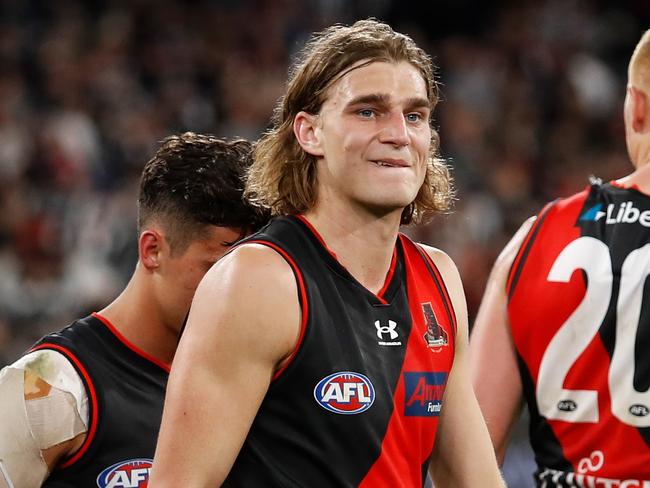 MELBOURNE, AUSTRALIA - JULY 24: Harrison Jones of the Bombers looks dejected after a loss during the 2022 AFL Round 19 match between the Collingwood Magpies and the Essendon Bombers at the Melbourne Cricket Ground on July 24, 2022 in Melbourne, Australia. (Photo by Dylan Burns/AFL Photos via Getty Images)