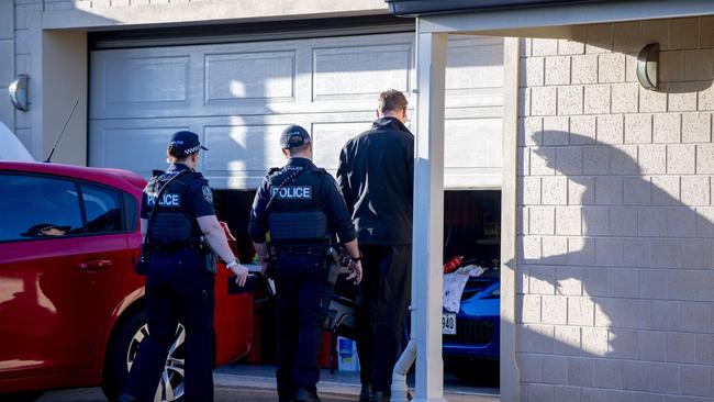 Police doorknock neighbours during the investigation of a suspicious death on Condada Ave Park Holme. Picture: Mark Brake