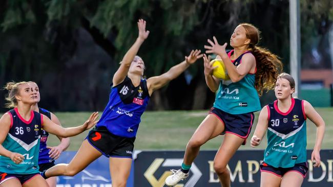 Evie Cowcher takes a mark for Peel Thunder. Picture: Shazza J Photography