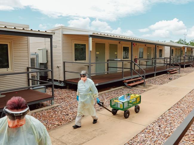 A swabbing team en route to conduct COVID tests at the Northern Territory’s Howard Springs quarantine facility. Picture: GLENN CAMPBELL