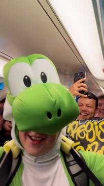 DJ dressed as Yoshi creates 'Mario Party' experience on train