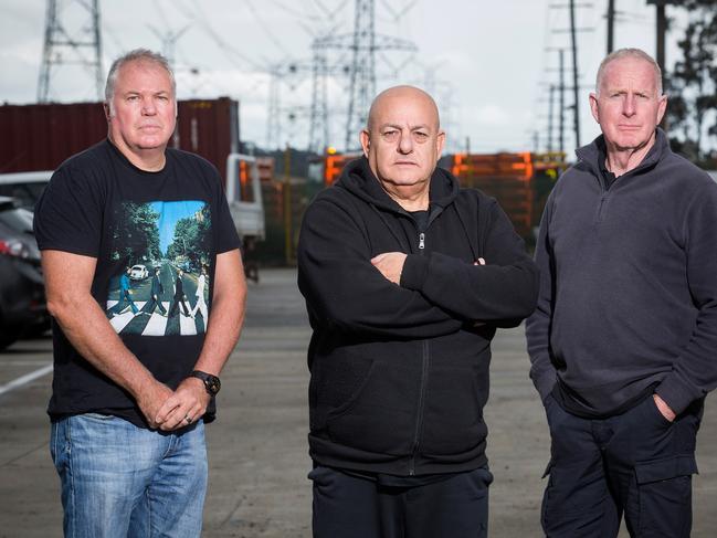 Firefighters (L-R) Paul Swain, Lou Mele and Stuart McCall sued the Andrews government. Picture: Paul Jeffers