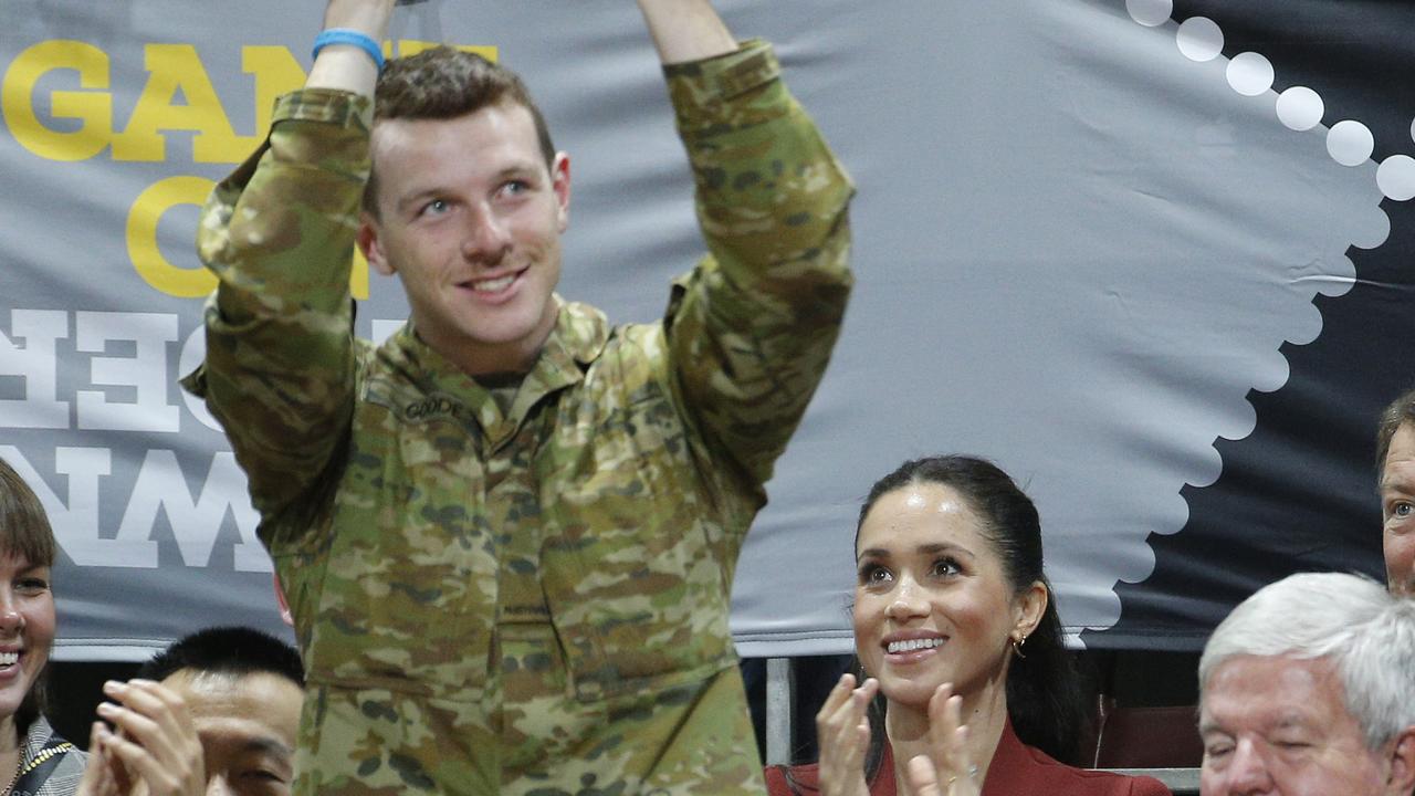 The Duchess of Sussex pictured in the Invictus Games crowd, sitting behind war heroes, at Sydney Olympic Park in Homebush. Picture: Richard Dobson.