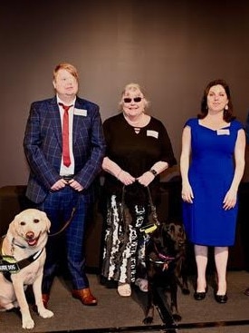 Craig Shanahan and his service dog Rocco at the awards.