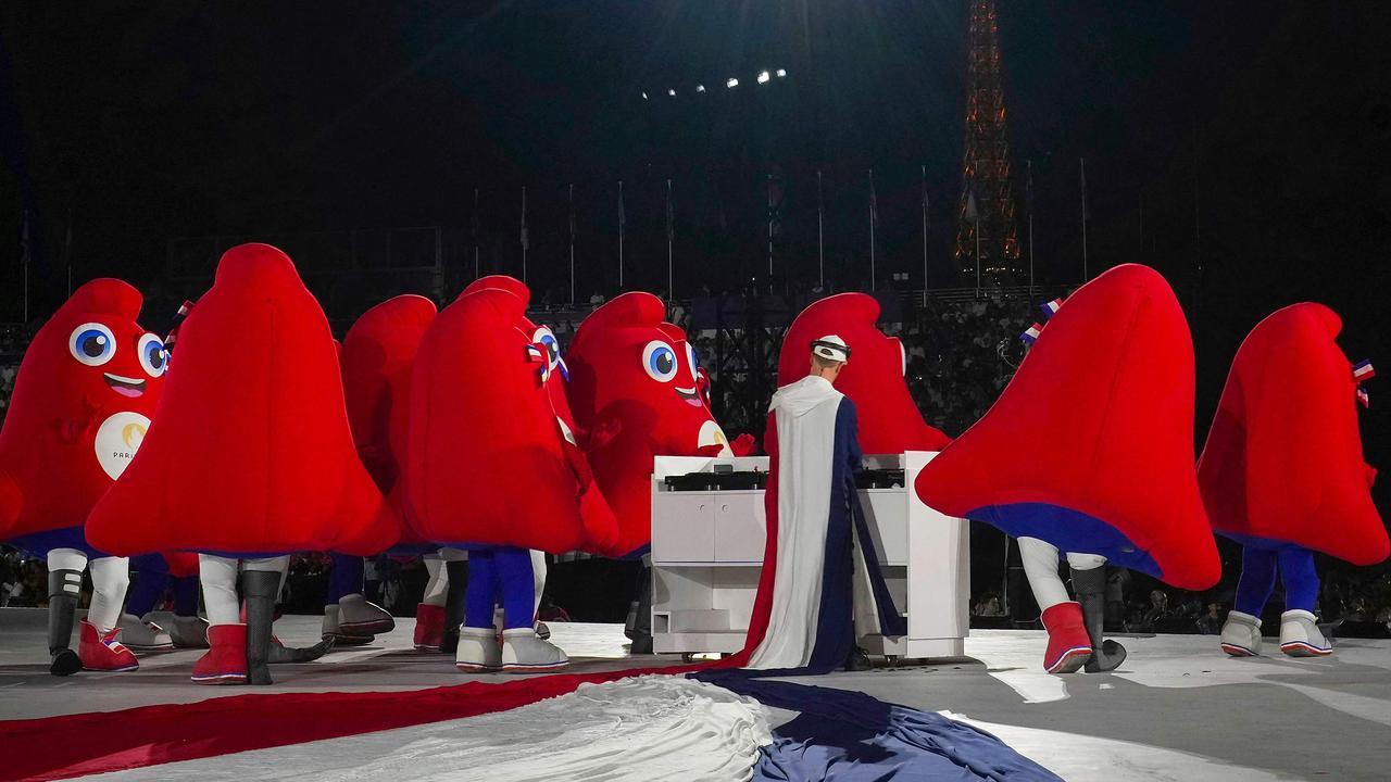 Even the funny little Phryges perform on stage at the opening of the Games. Picture: Thibault Camus/POOL/AFP