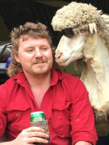 Ash Gardner, left, of Humpty Doo, is the proud owner of Australia’s fiercest bloody mullet. He received 15.4% of the total vote