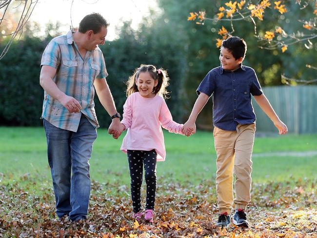 Adoring family. Alicia Terlato, centre, with her devoted father Paul (left) and big brother Luke. Picture: Alex Coppel