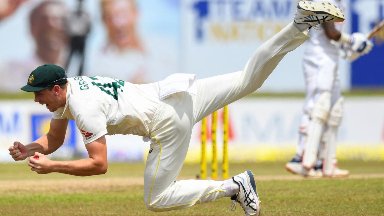 Cameron Green takes a stunning catch during the second session on day two. Picture: AFP