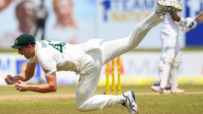 Cameron Green takes a stunning catch during the second session on day two. Picture: AFP